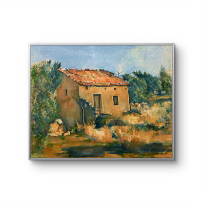 Framed painting of a rustic building with a landscape background