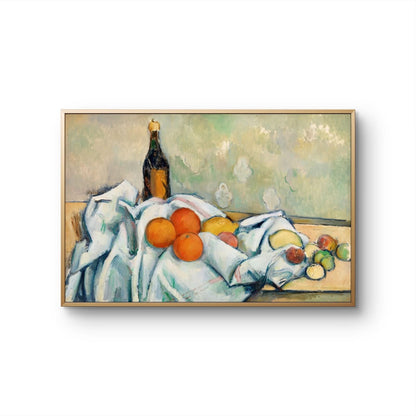 Framed still life painting with fruits and a bottle on a white background