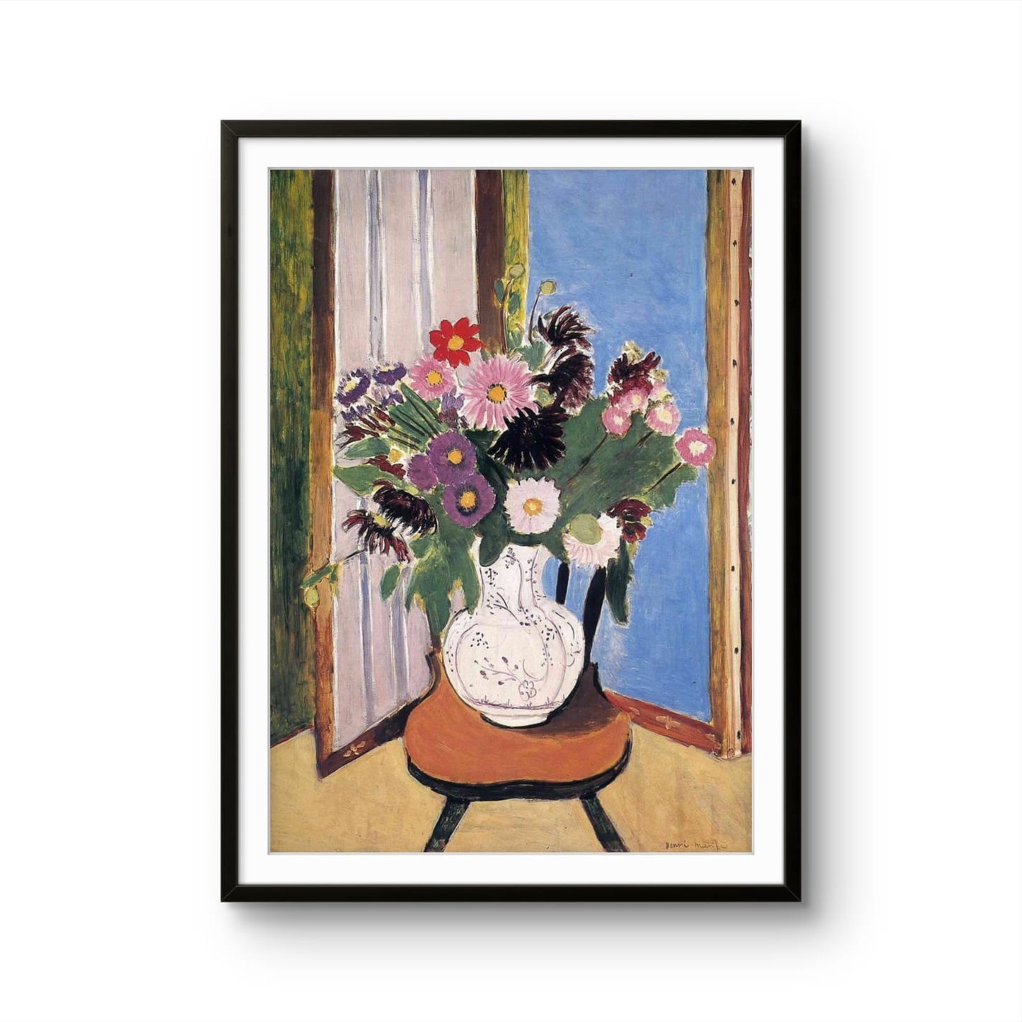Framed artwork of a vase with flowers in front of a window