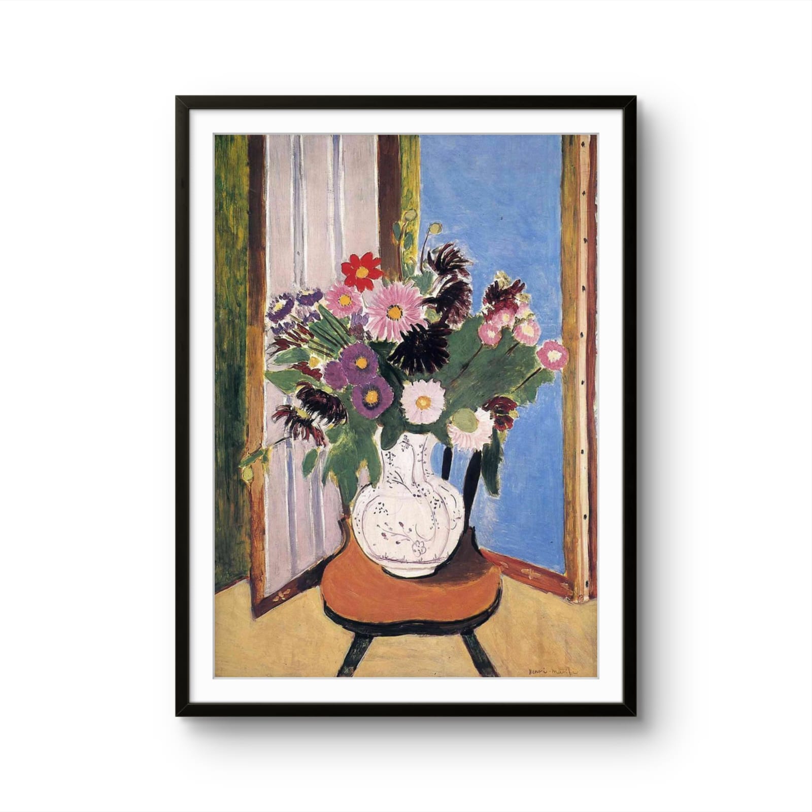 Framed artwork of a vase with flowers in front of a window