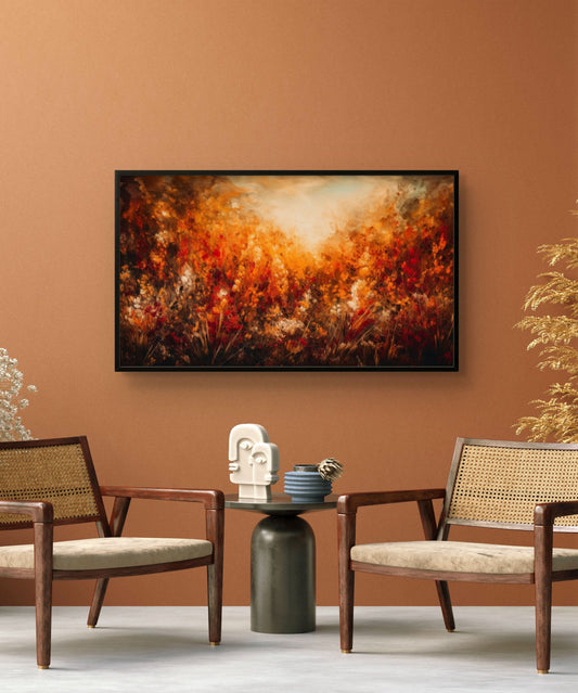Living room with two chairs, a small table, and a colorful abstract painting on an orange wall.