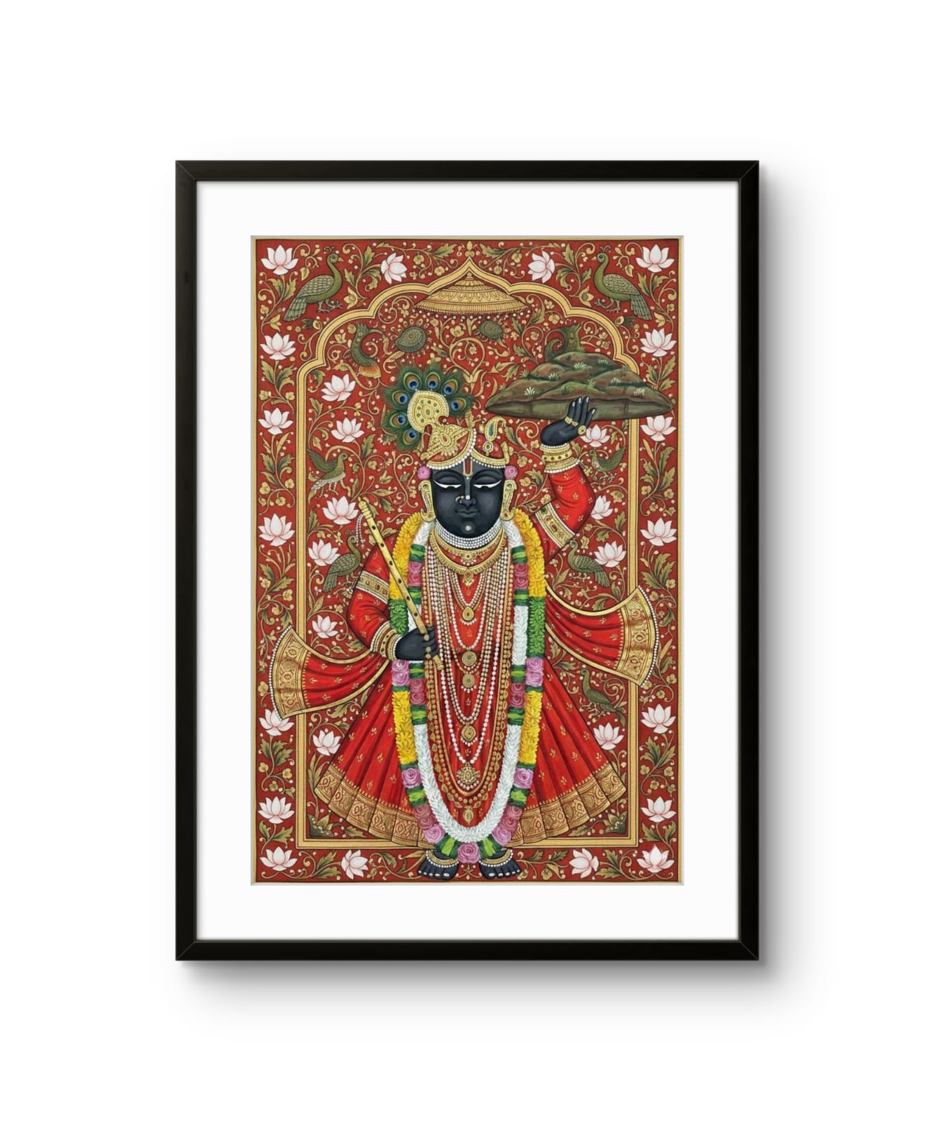 Framed artwork of a colorful depiction of a deity with intricate details on a white background