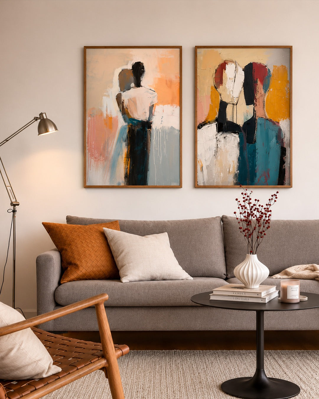 Living room with a gray sofa, abstract art on the wall, and decorative items.