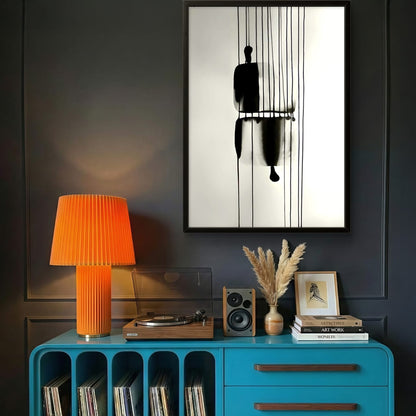 Blue console table with vinyl records, orange lamp, and decor items against a dark wall.