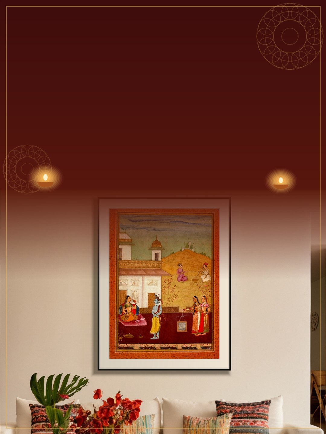 Diwali gifting – framed Indian art above a cream sofa with diyas and rangoli