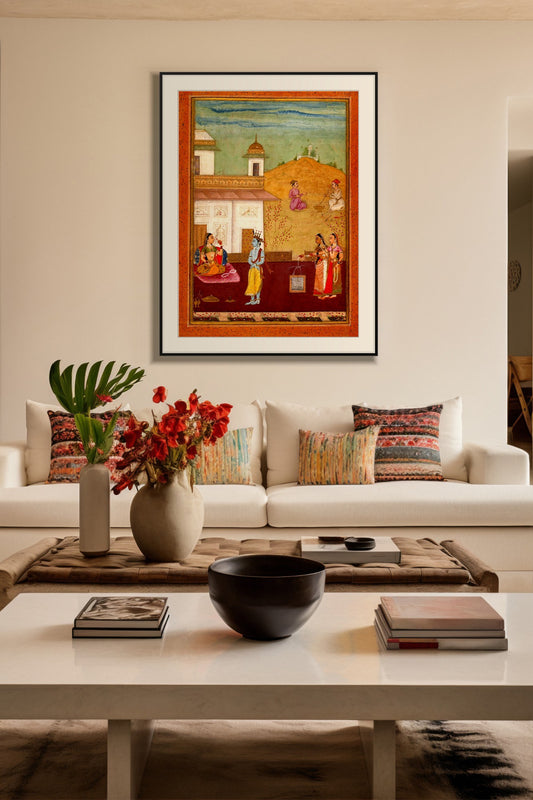 Krishna in the Palace Garden art print in a black frame with mount above a cream sofa