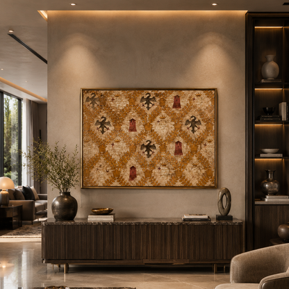 A large framed wall art piece with an ornate beige, gold, and brown damask pattern hangs above a dark wood console in a modern, elegantly decorated living room.