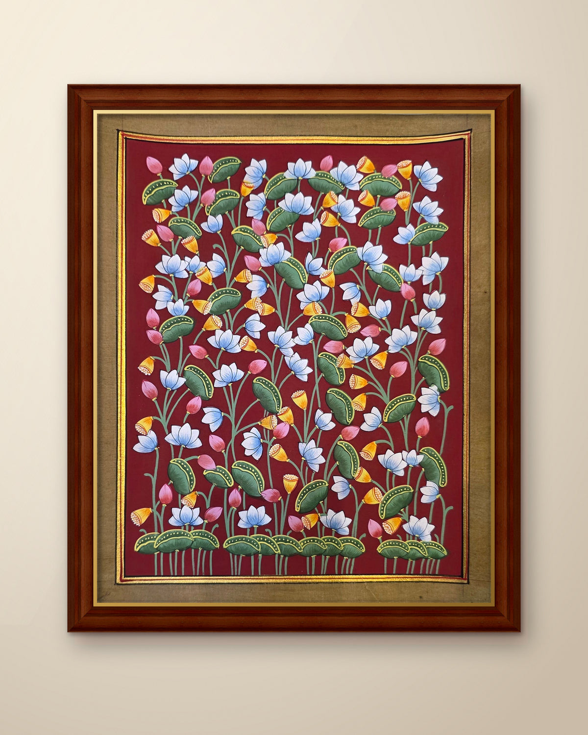 Kamal Van Lotus Garden - Maroon Pichwai shown in a walnut wood frame (frame sold separately)