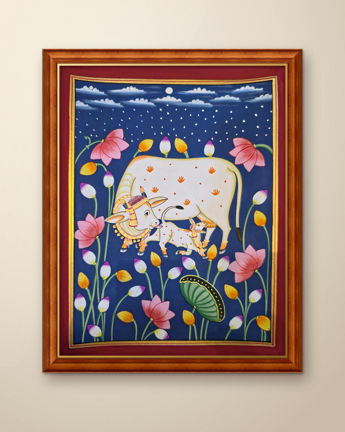 Kamdhenu in the Lotus Pond - Navy Pichwai shown in a teak wood frame (frame sold separately)