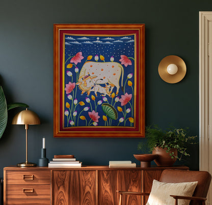 Kamdhenu in the Lotus Pond - Navy Pichwai styled on a wall in a teak wood frame (frame sold separately)