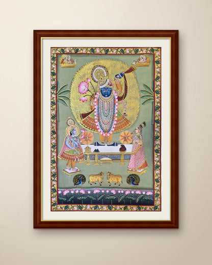 Shrinathji Darshan - Sage Pichwai shown in a walnut wood frame (frame sold separately)