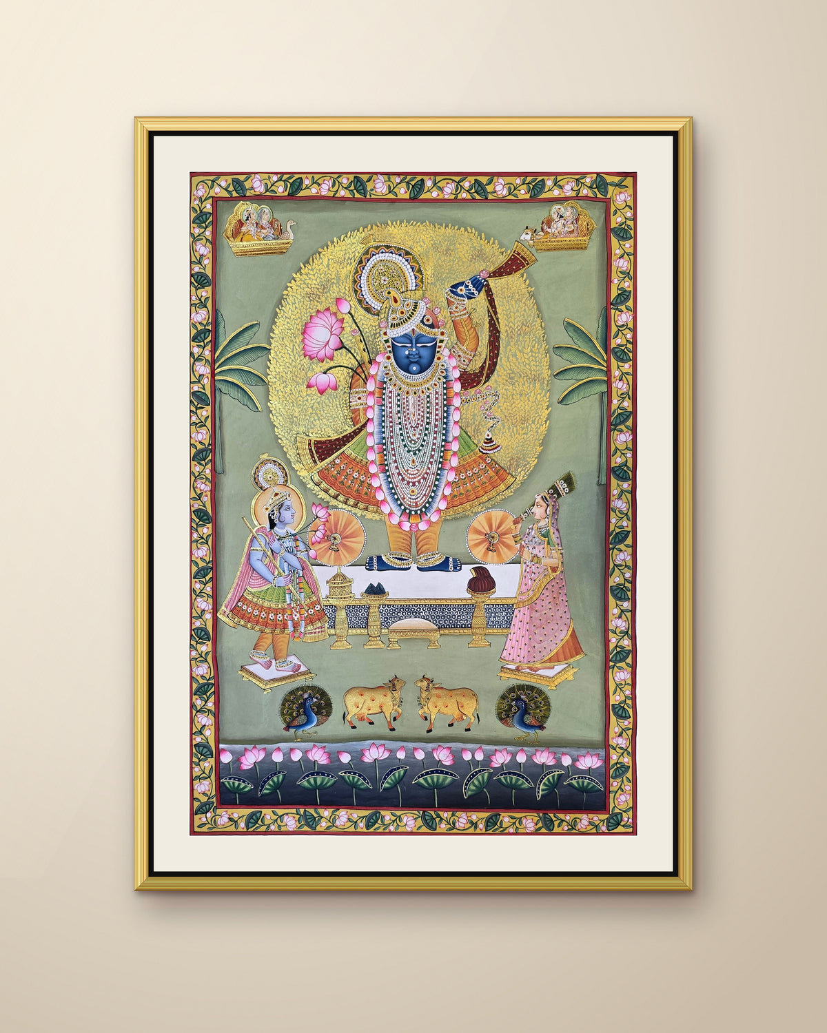 Shrinathji Darshan - Sage Pichwai shown in a gold metal frame (frame sold separately)