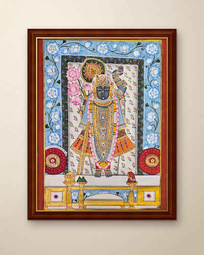 Shrinathji Phool Mandali - Ivory and Blue Pichwai shown in a walnut wood frame (frame sold separately)
