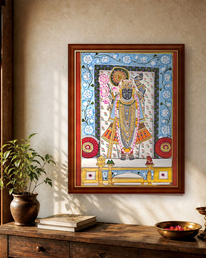 Shrinathji Phool Mandali - Ivory and Blue Pichwai styled on a wall in a walnut wood frame (frame sold separately)