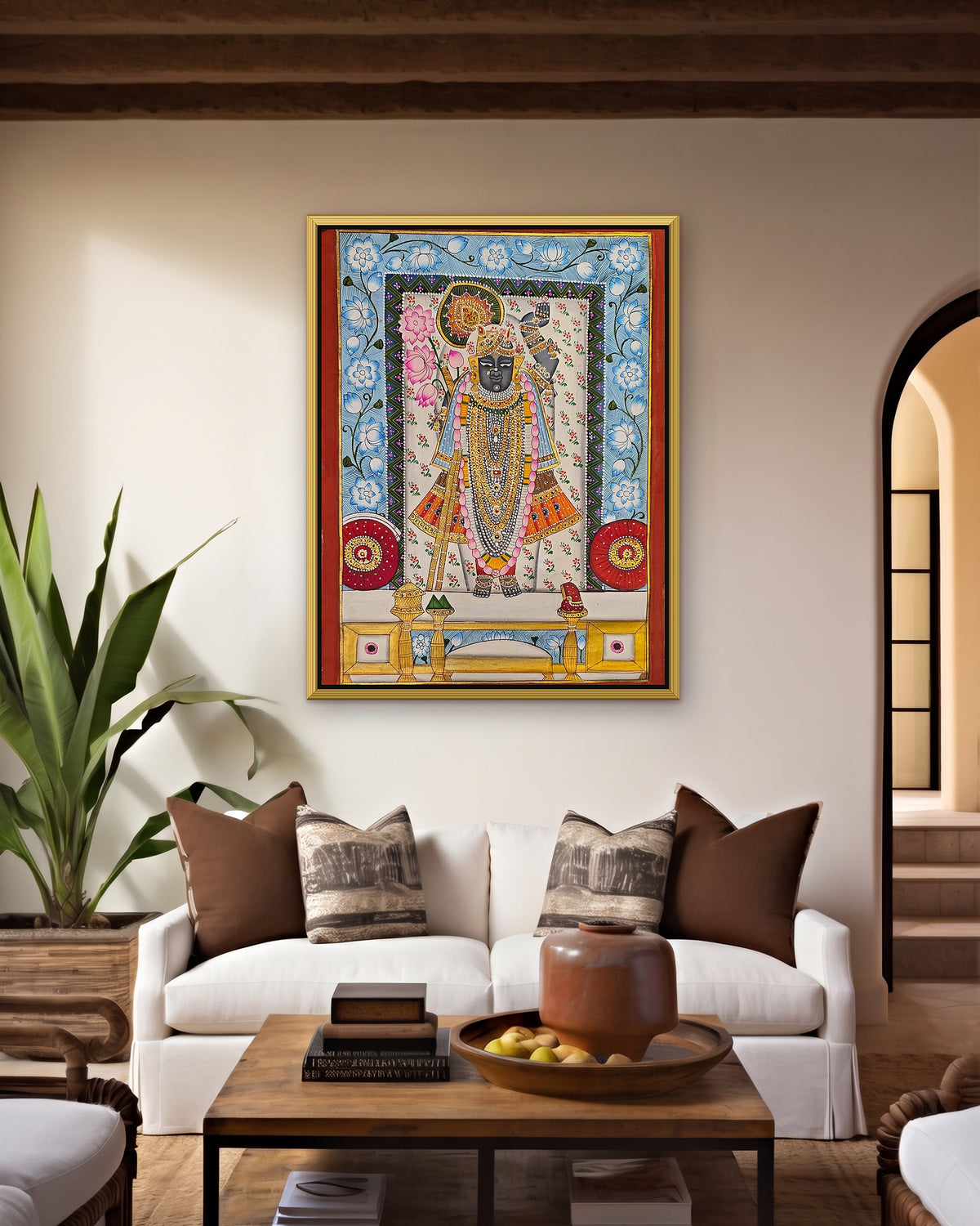 Shrinathji Phool Mandali - Ivory and Blue Pichwai styled on a wall in a gold metal frame (frame sold separately)