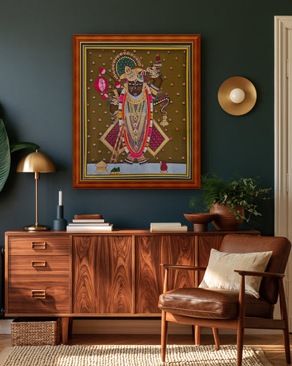 Shrinathji Shringar - Antique Olive Pichwai styled on a wall in a teak wood frame (frame sold separately)