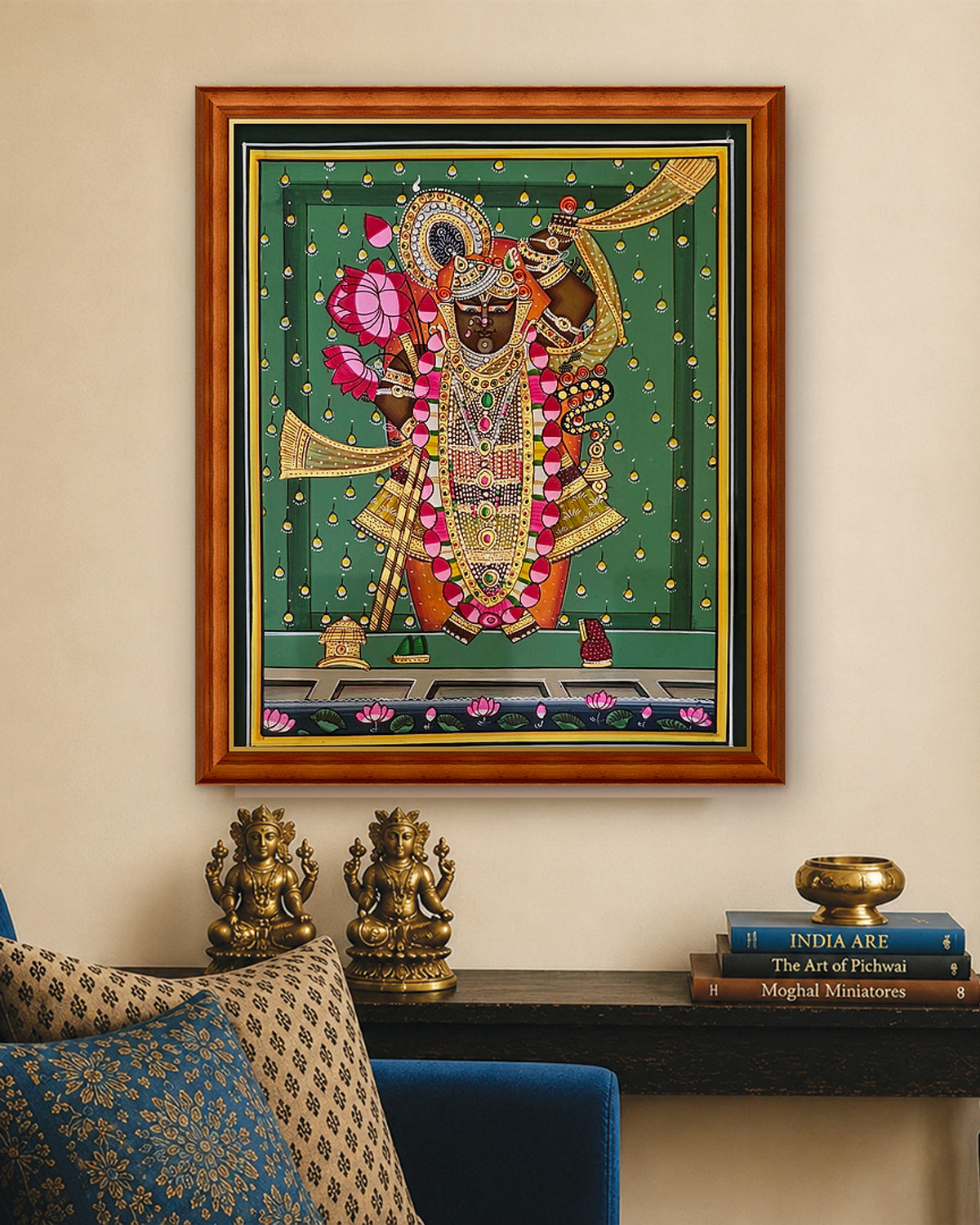 Shrinathji Shringar - Emerald Pichwai styled on a wall in a teak wood frame (frame sold separately)