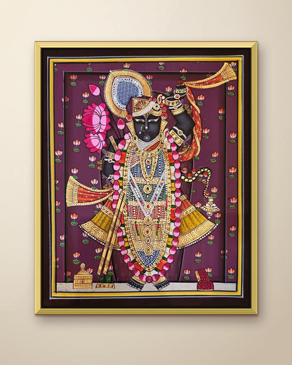Shrinathji Shringar - Royal Plum Pichwai shown in a gold metal frame (frame sold separately)