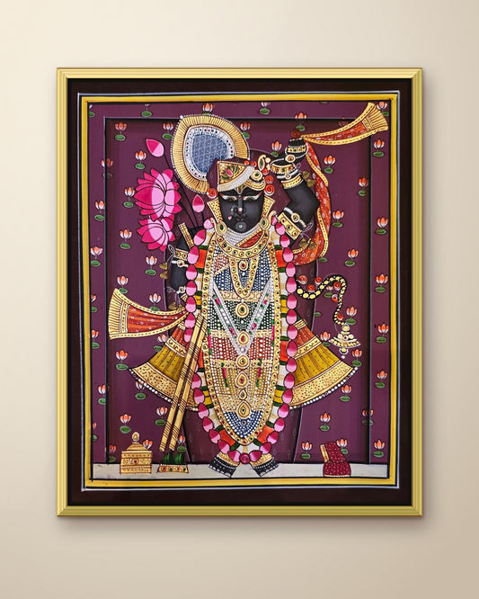 Shrinathji Shringar - Royal Plum Pichwai shown in a gold metal frame (frame sold separately)