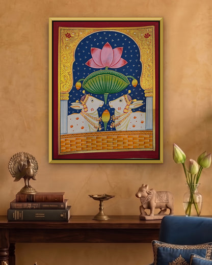 Twin Gaumata Under the Lotus Arch - Navy Pichwai styled on a wall in a gold metal frame (frame sold separately)