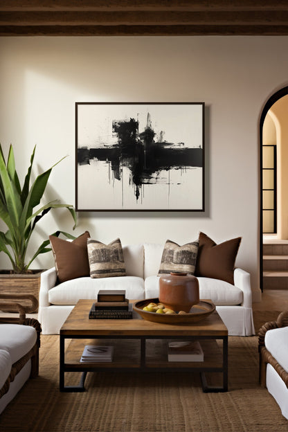 Shadow Horizon abstract art framed above a white sofa in a warm living room
