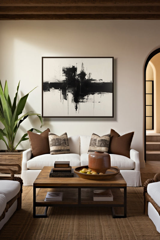 Shadow Horizon abstract art framed above a white sofa in a warm living room