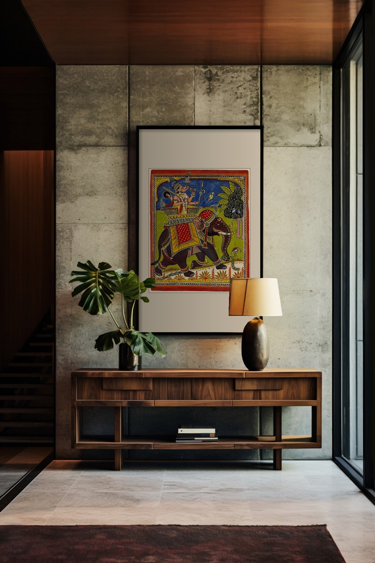 Lord Varaha on the Royal Elephant framed print above a walnut console in a concrete hallway
