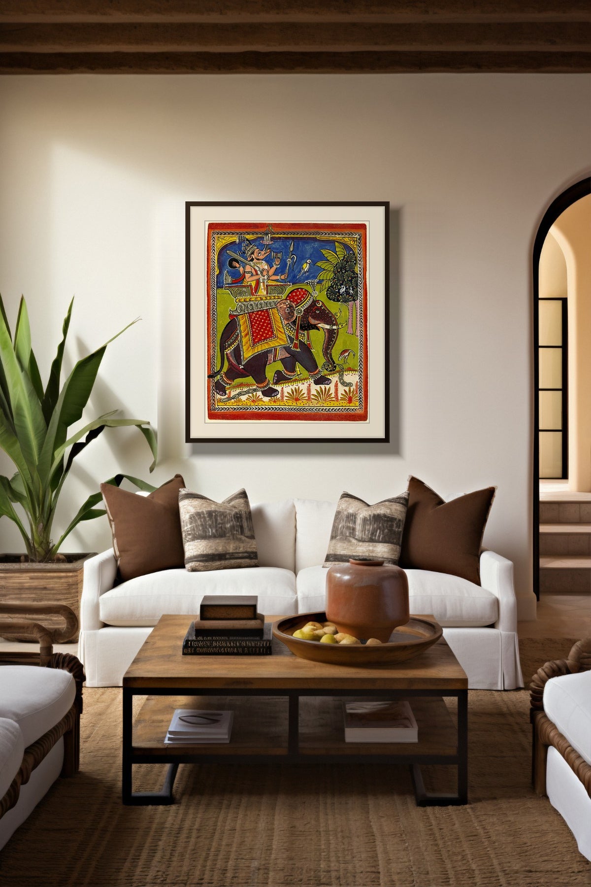 Lord Varaha on the Royal Elephant print with white mount framed above a white sofa