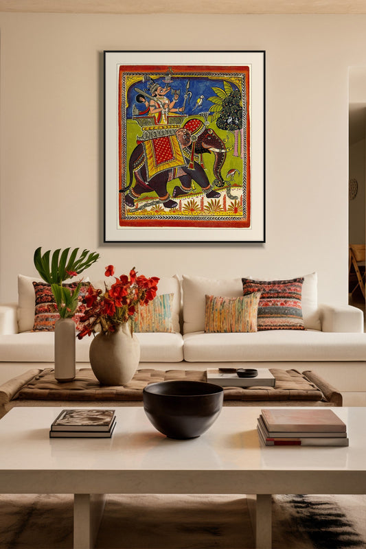 Lord Varaha on the Royal Elephant art print in a black frame with mount above a cream sofa
